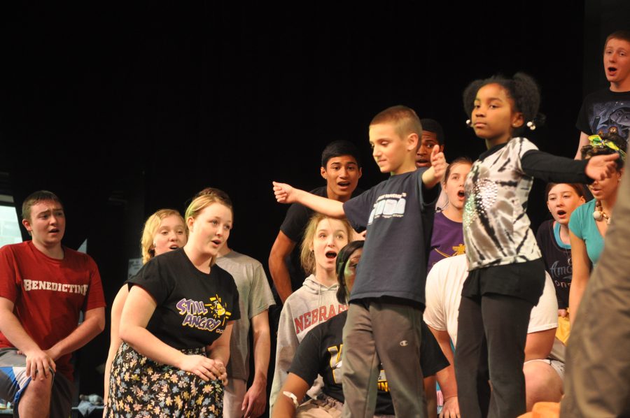 The cast of Once On This Island rehearse for the opening night.