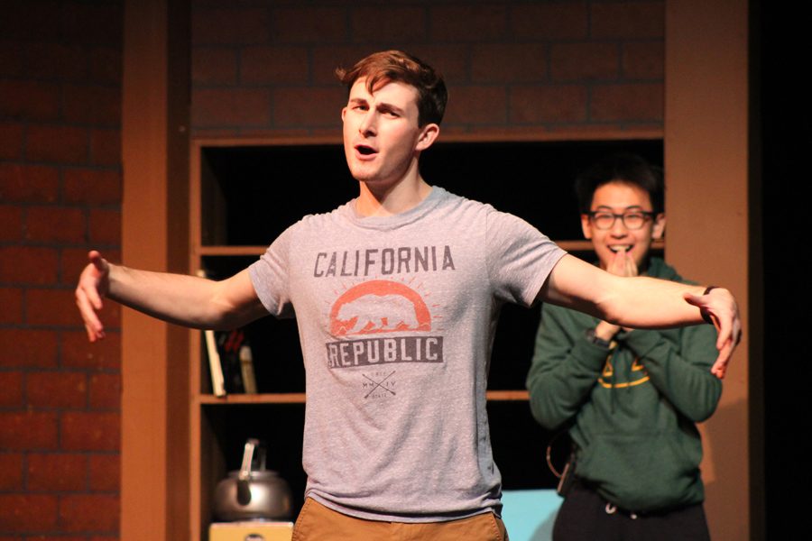 Senior Dawsen Ragone practices for his role in the musical as Robert Martin while senior Jimmy Nguyen excitedly looks on as the character The Man in the Chair. 