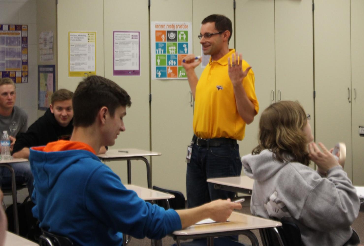 Chad Huseth teaches his career development students during class fourth hour.