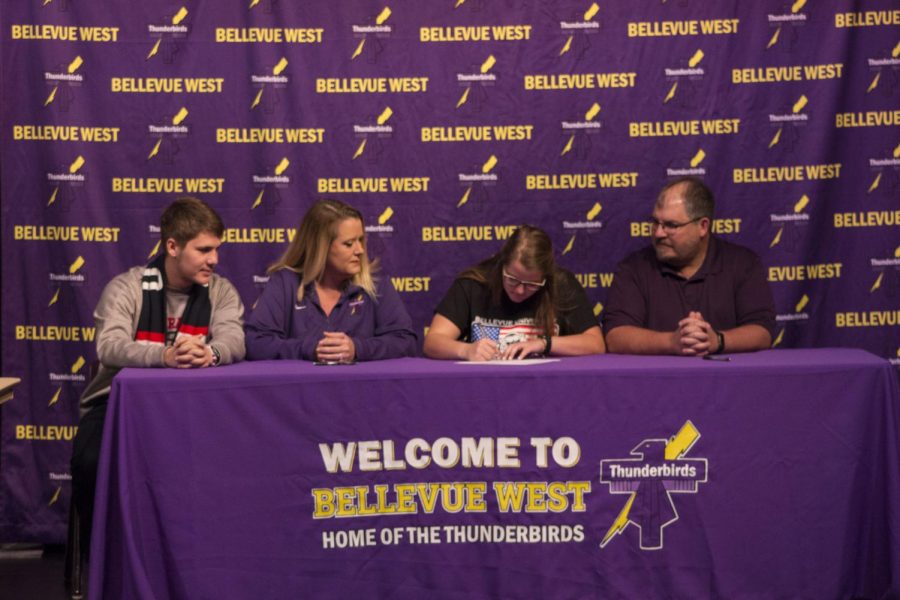 Senior Madison Machacek signs letter of intent with Bellevue University. Her coach, Laura Kratochvil commented that “from the moment she stepped on our school to work on softball she had a little something special.”