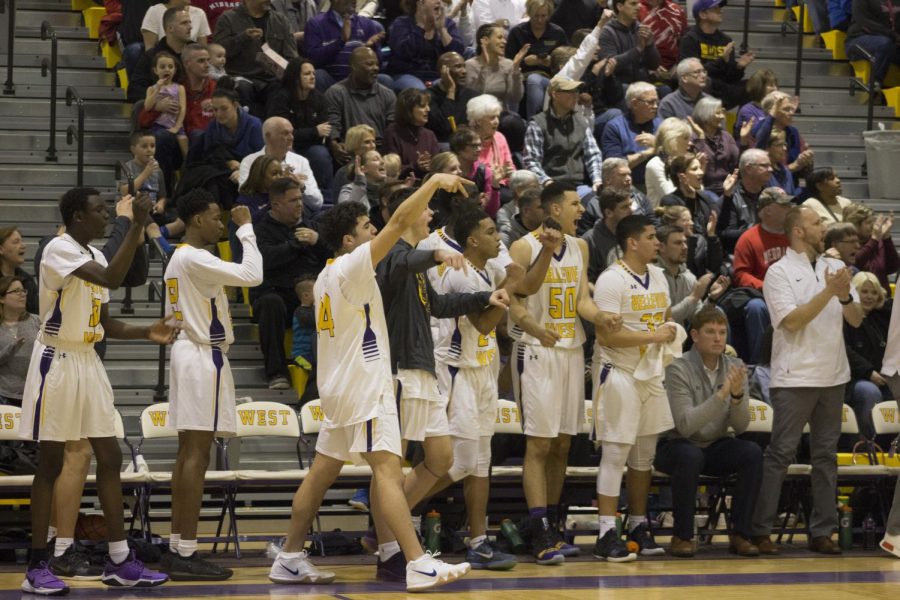 Bellevue West bench celebrates during the Feb. 8 game against No. 5 Creighton Prep.