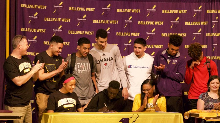 Senior Deng Jal signs a letter of intent with Bellevue University for basketball. “He’s going to do a tremendous job. I’m excited to keep him around here. I couldn’t be happier for him,” Coach Doug Woodard said. 