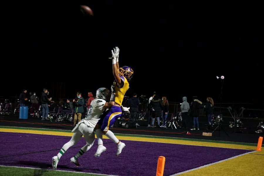 Senior wide receiver Keagan Johnson attempts to catch the ball for another touchdown.