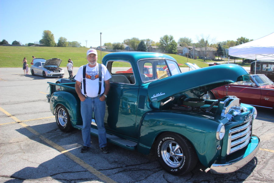 Owner Tim Evers poses in front of his GMC, 1950 pickup truck.