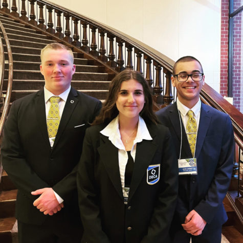 Junior Jackson Anderson, senior Lou Hure and senior Javon Jarmon pose for a picture at the state competition.
