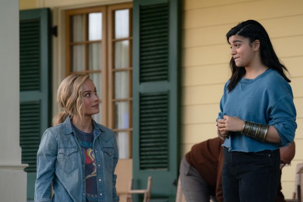 Brie Larson and Iman Vellani share a moment in The Marvels, released Nov. 10.