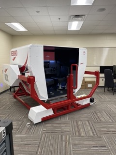 A simulator which makes use of a full range of motion will be used in the aviation program that launches in the fall. Photo courtesy of Dr. Robert Moore.