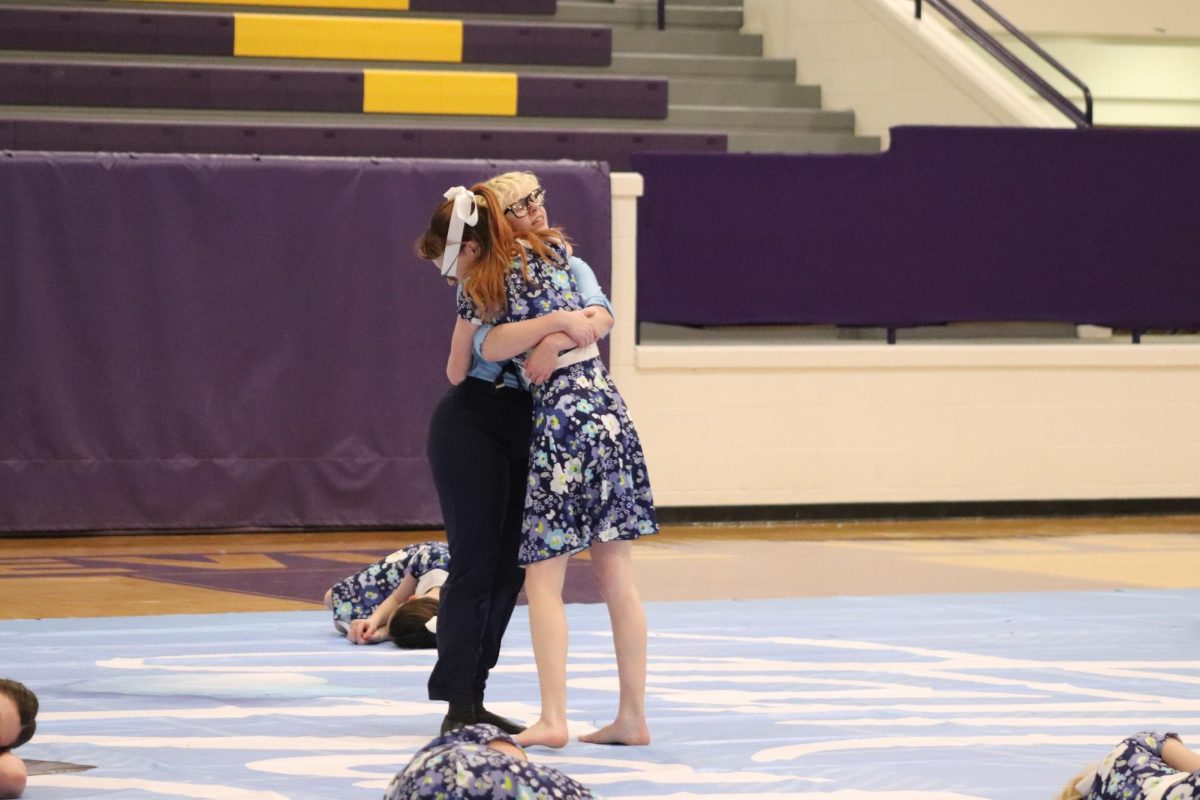 Paige Reisz and Jay Maughmer finish the performance with an emotional hug.