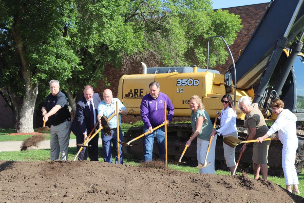 School+board+members%2C+Superintendent+Jeff+Rippe%2C+and+Principal+Kevin+Rohlfs+break+ground+for+the+new+auditorium.+