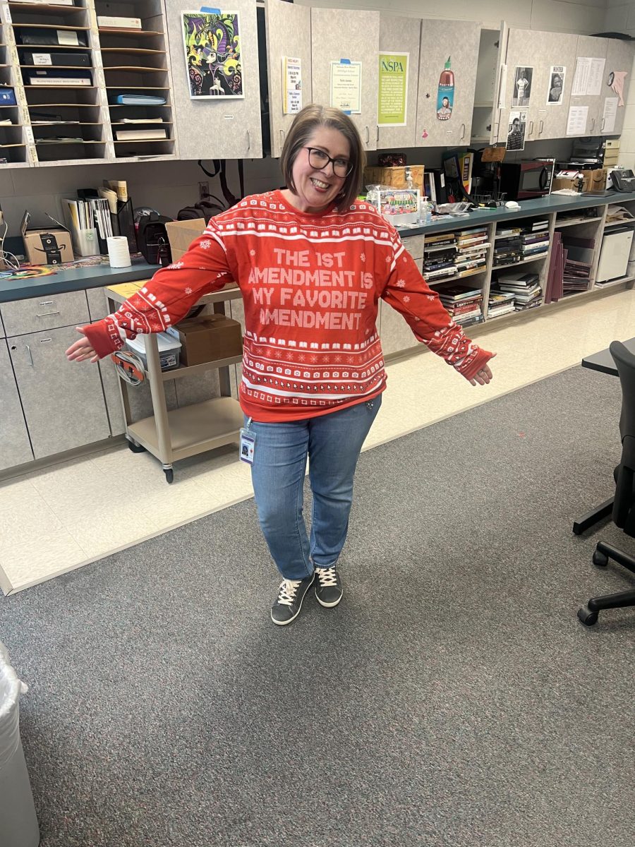 Journalism teacher Julie Rowse celebrates the holidays and The First Amendment with her ugly holiday crewneck.