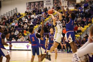 Senior Robby Garcia goes for a layup during the game against Omaha Westview on Jan. 28.