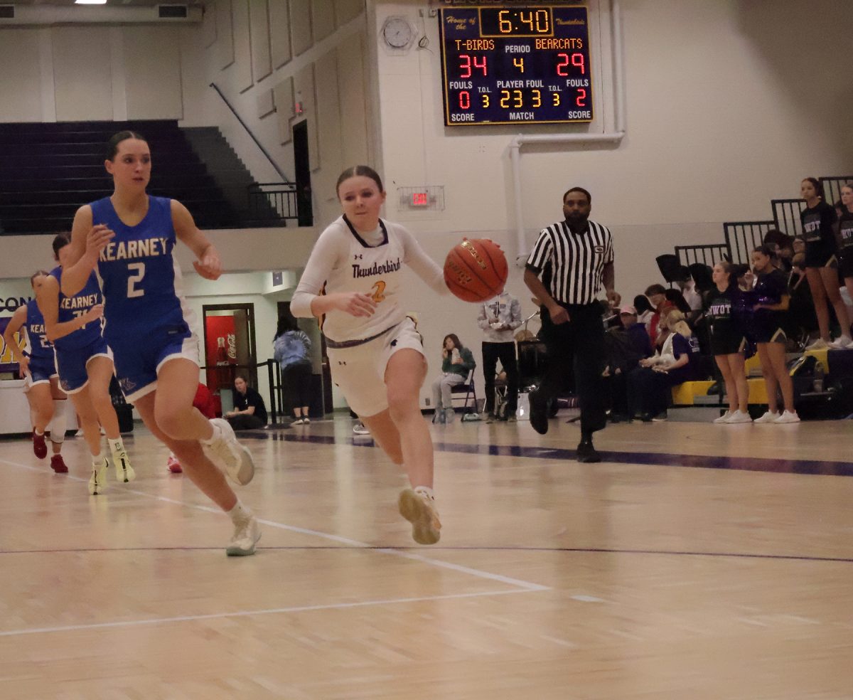 Vanna Reitsma dribbles down the court against Kearney.