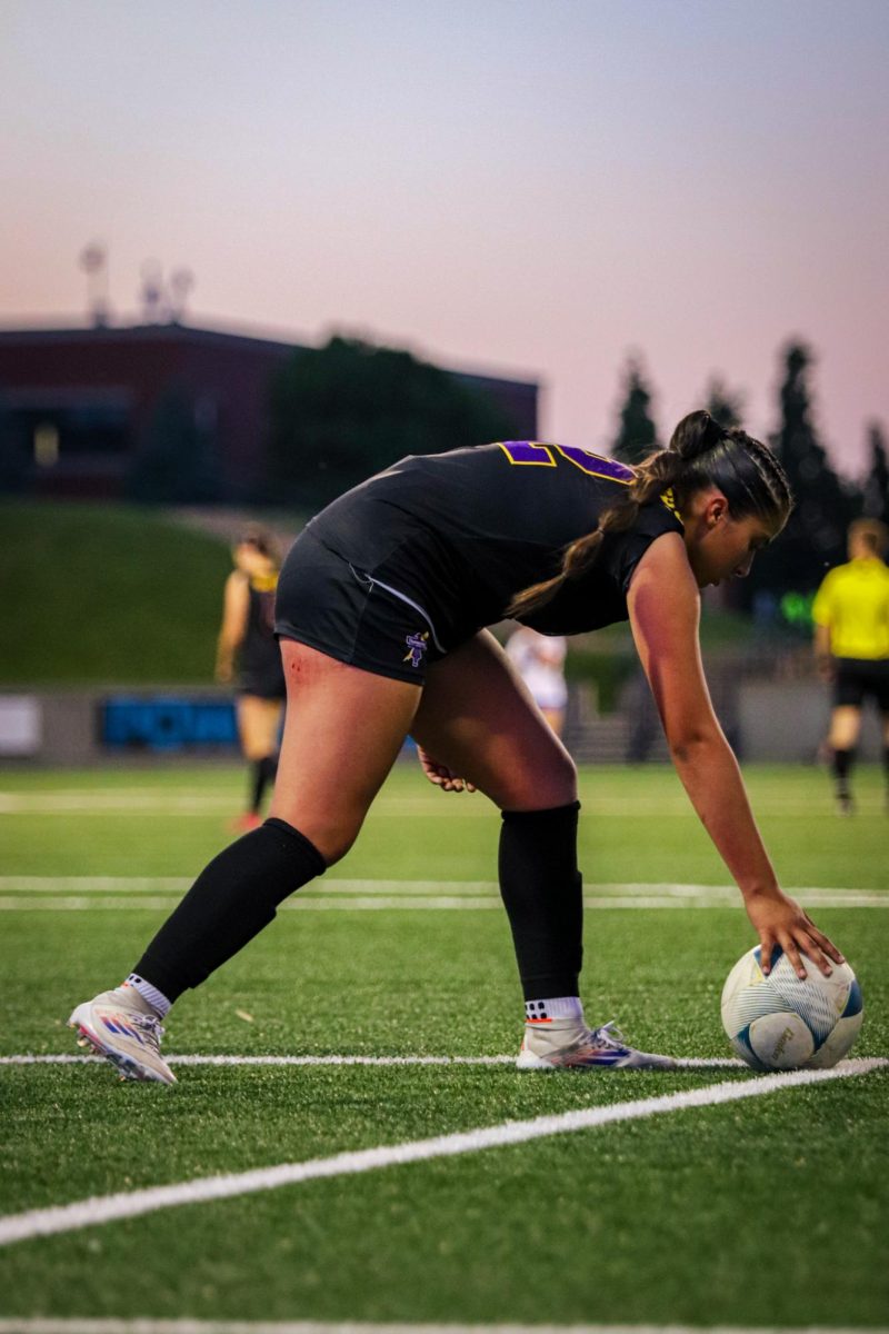 Junior Ashley Ramirez prepares to kick the ball down the field.
