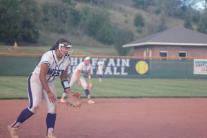 The softball team prepares for the hit.
