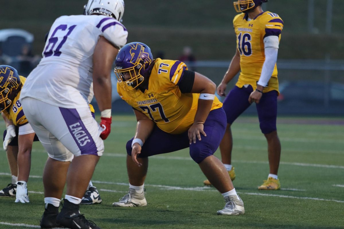 Junior Raul Mejia sets up in a lineman stance.