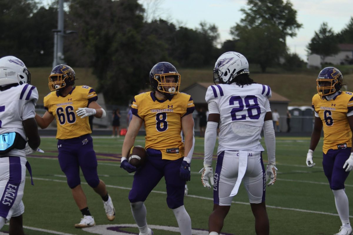 Junior Dylan Miller stares down competition after completing a play. 