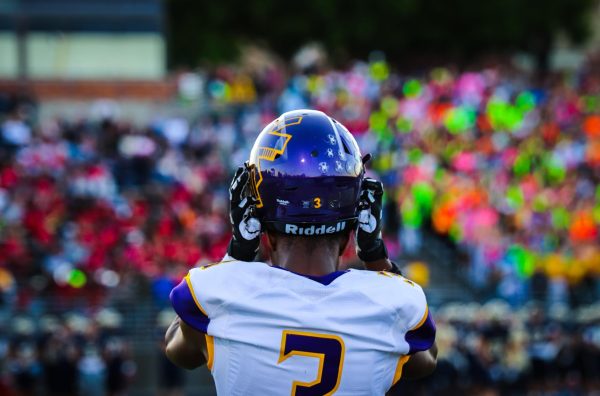 Junior Bryce Johnson heads onto the field.
