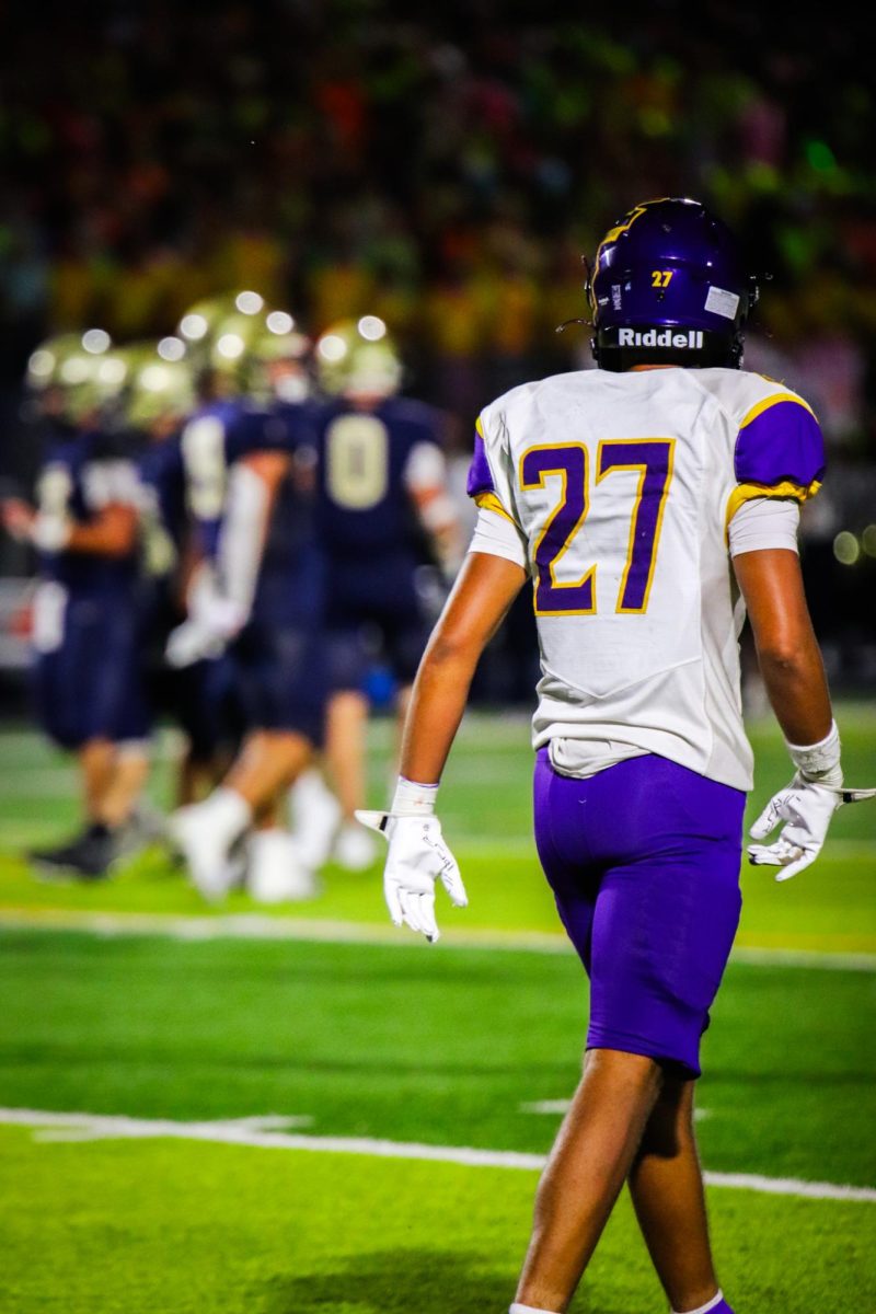 Senior Dominic Barry gets ready for the next play to start.