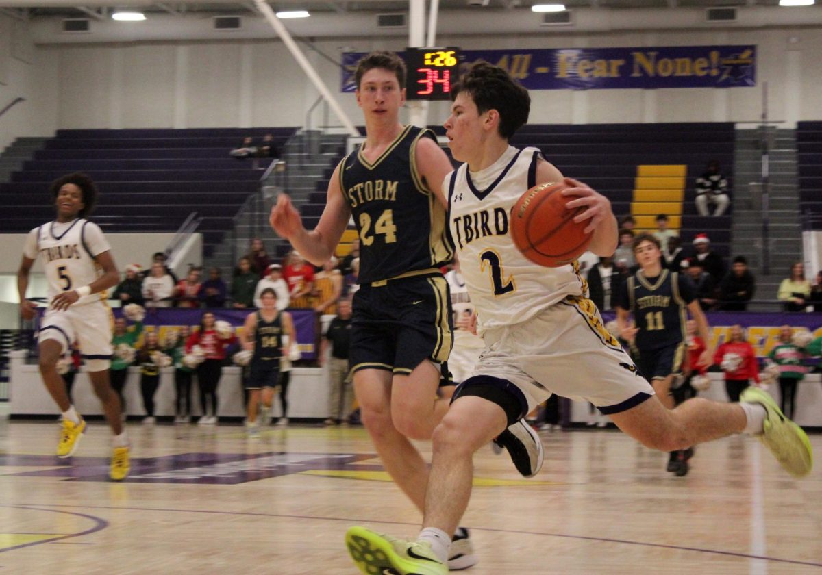 Junior Brayden Mauro breaks for the hoop.