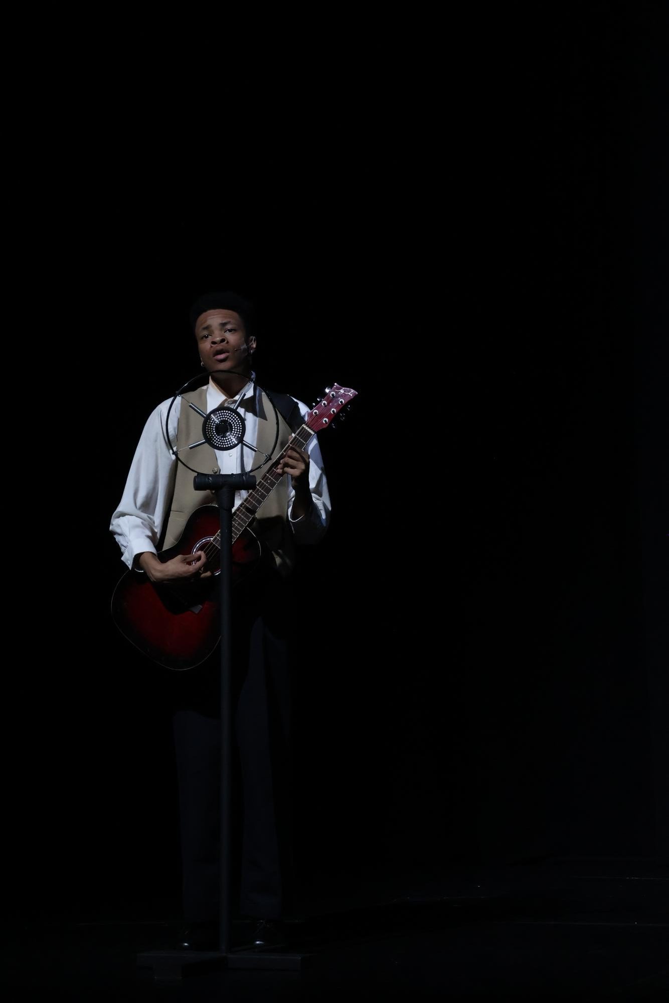 Senior Dorian Kellogg performs their solo part of “Edlewiss.”