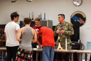 Colonel Garret Hogan works with JROTC students as he transitions to take over the program for the 2026-2027 school year.