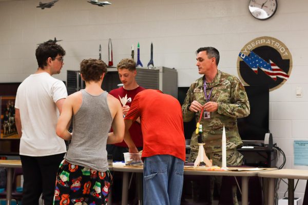 Colonel Garret Hogan works with JROTC students as he transitions to take over the program for the 2026-2027 school year.